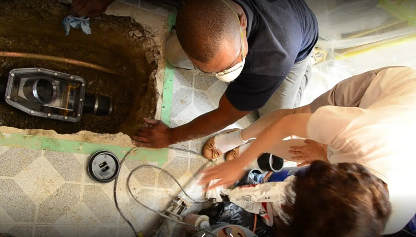 Flood Ready team reviewing residential flood-protection equipment