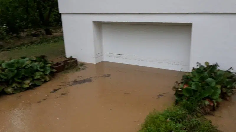 Residential garage opening exposed to surface flooding